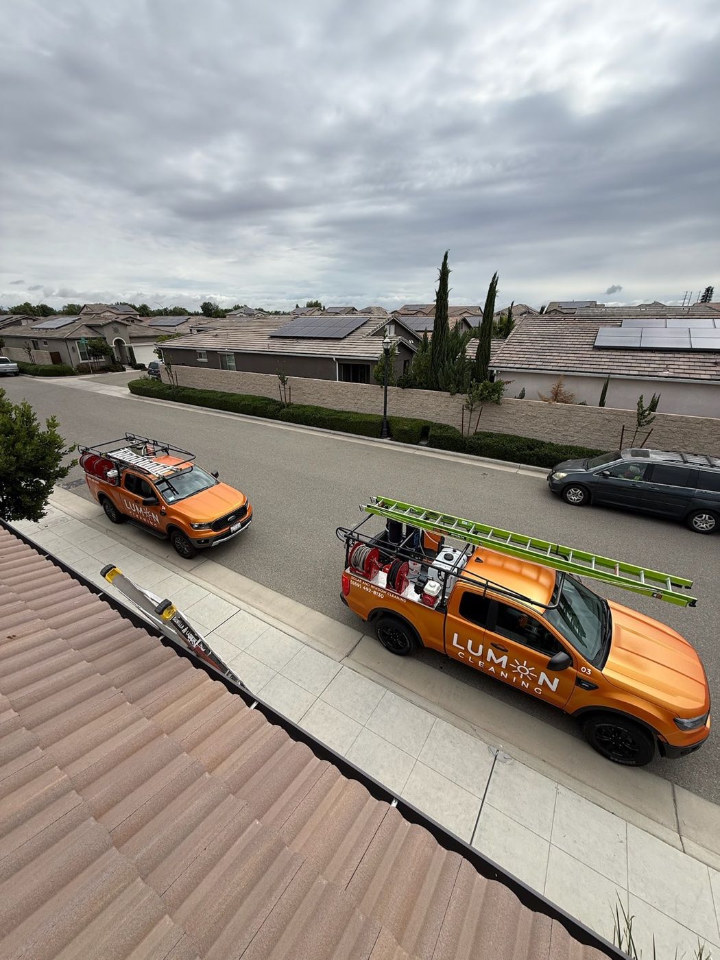Rooftop solar panels in Fresno under low angle late October sun