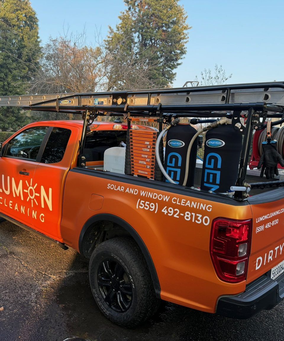 Lumon branded truck loaded with solar and window cleaning equipment