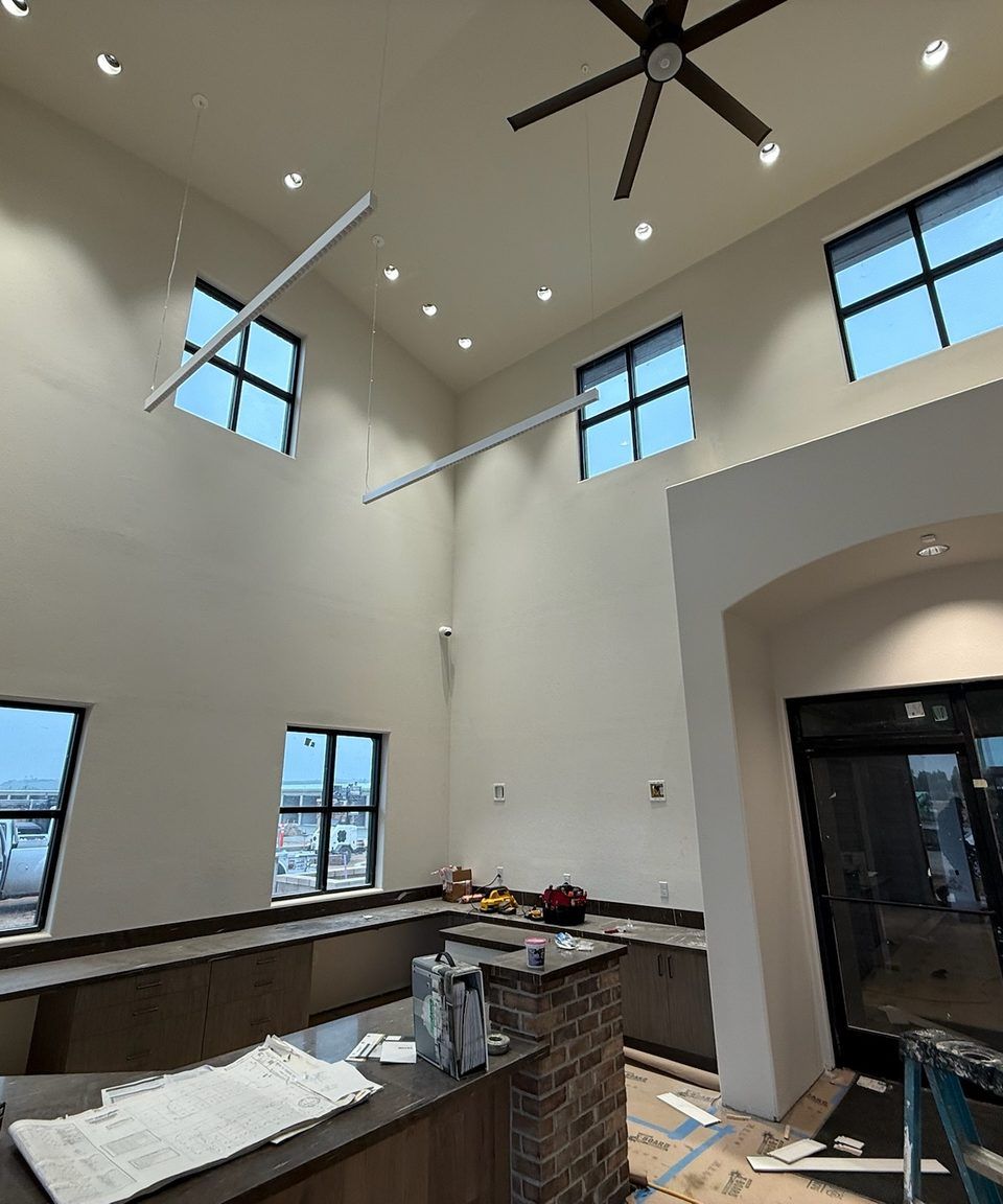 Tall interior windows cleaned to a streak-free shine